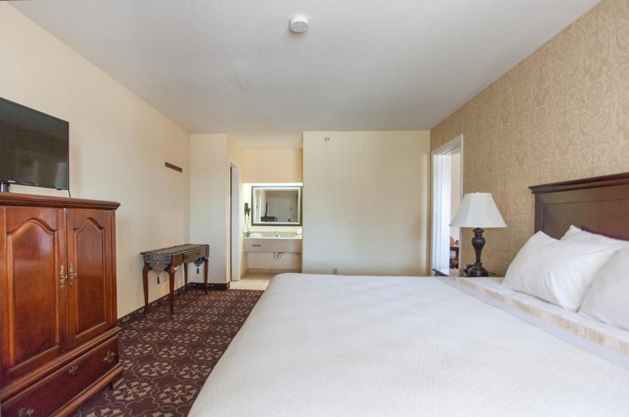 דה וודלנדס Days Inn By Wyndham Shenandoah מראה חיצוני תמונה
